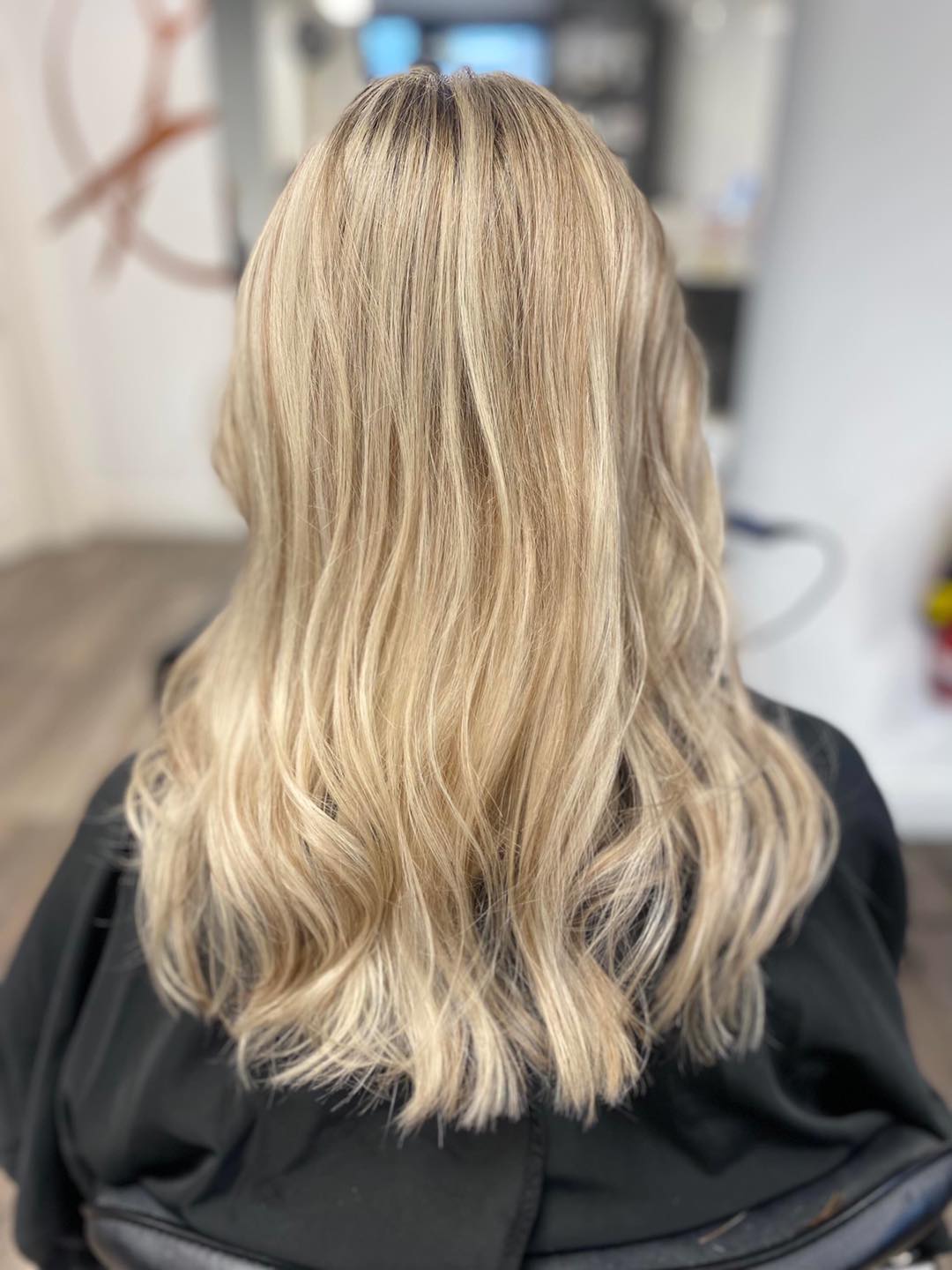 Beautiful blonde hair styling at NU U 2